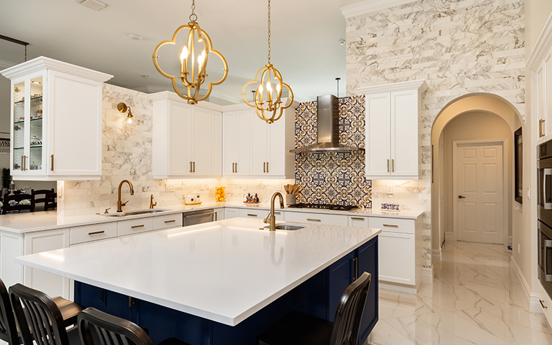 Beautiful luxury home kitchen with white cabinets.